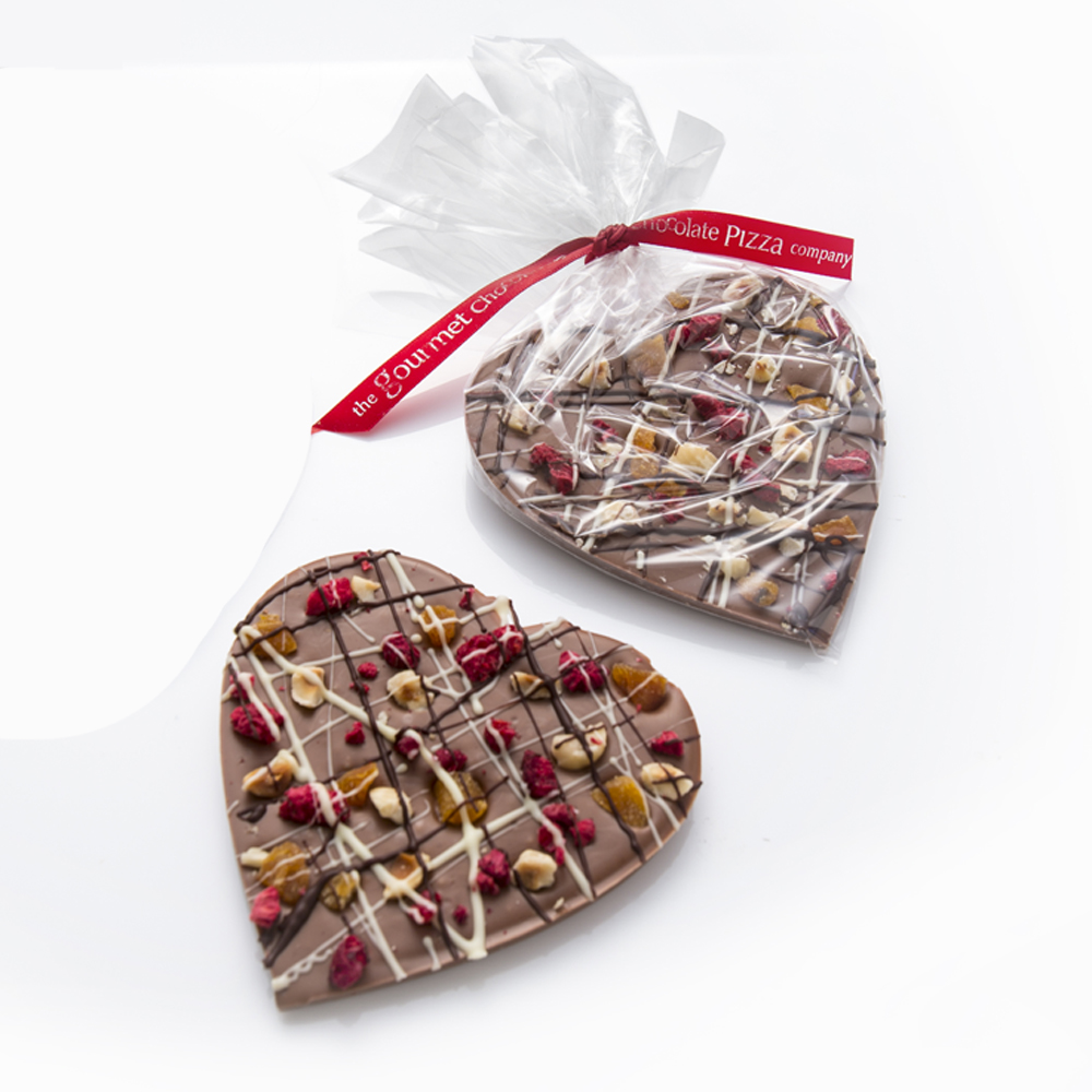 Our milk chocolate hearts are made with solid Belgian milk chocolate and drizzled with white and dark chocolate